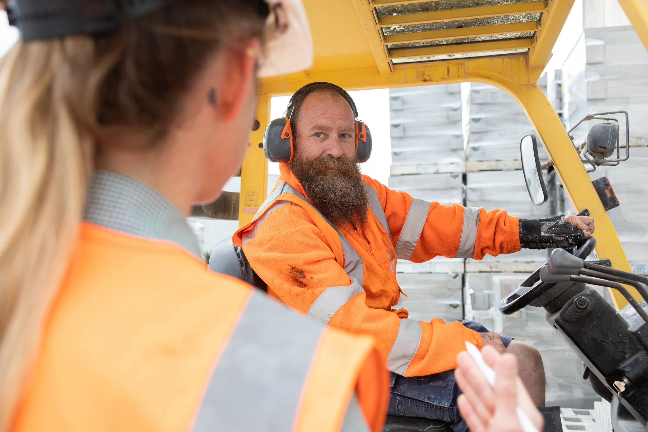 Man driving forklift at factory