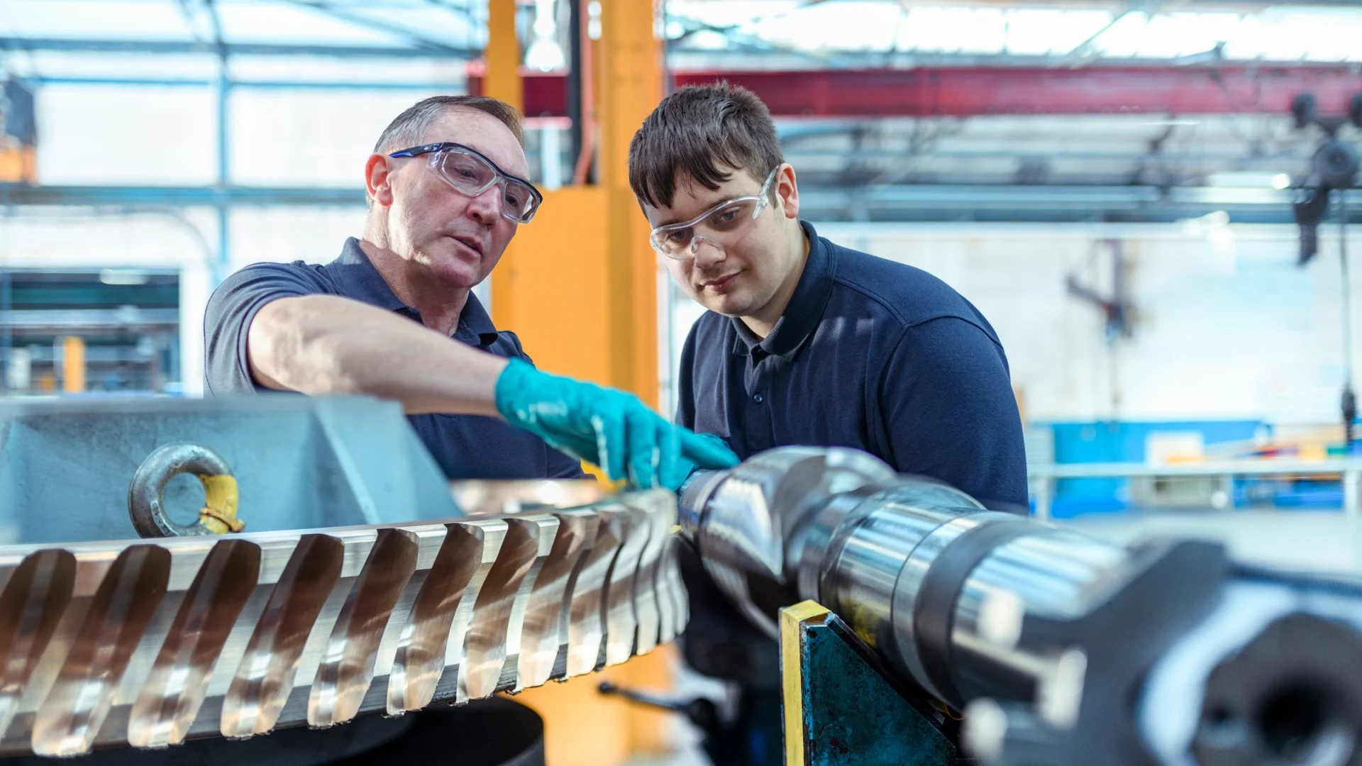 Employer teaching his apprentice.