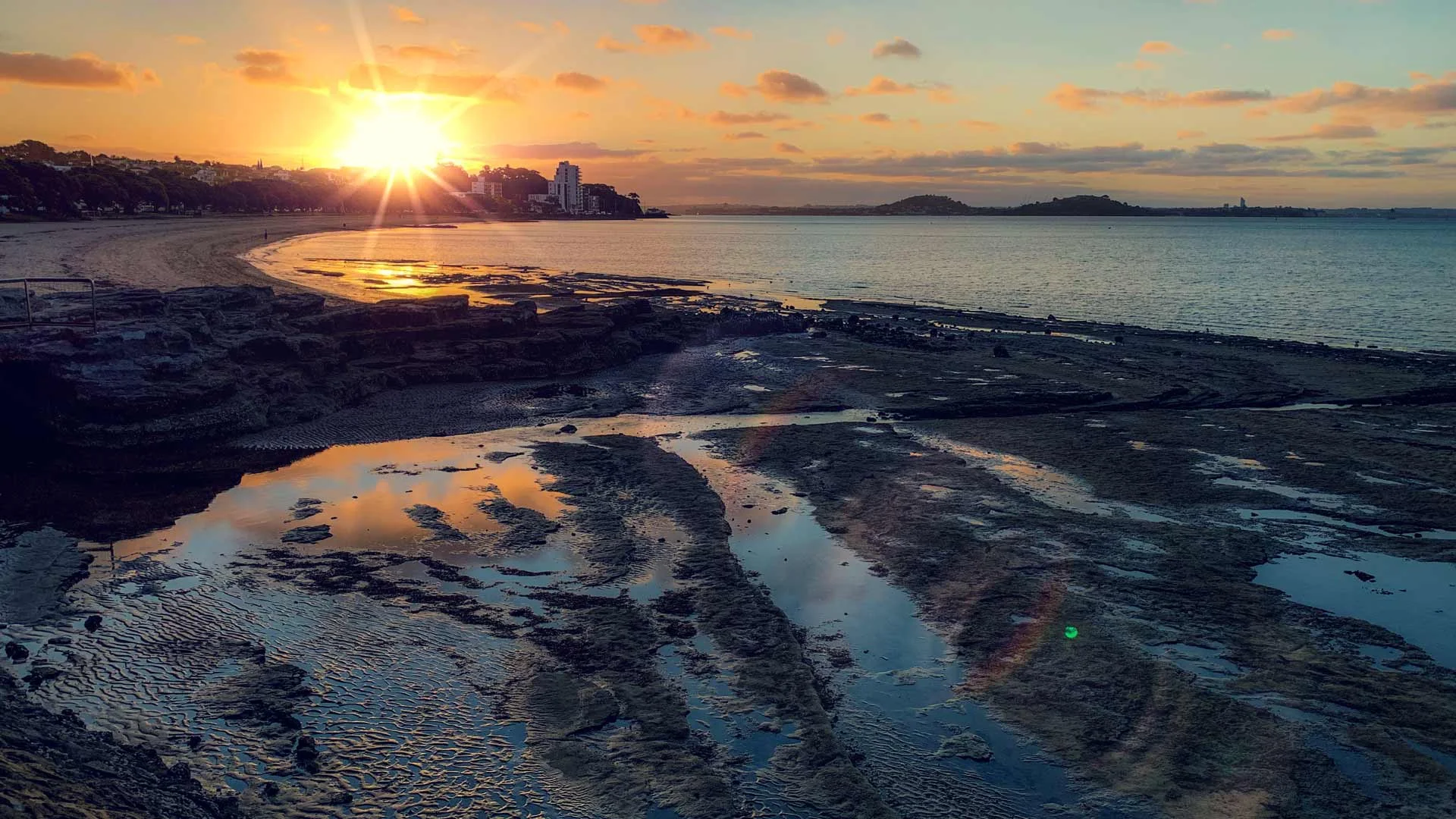 View of Kohimarama Beach at sunset.