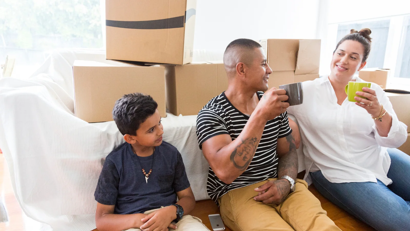 Couple with son in new property.