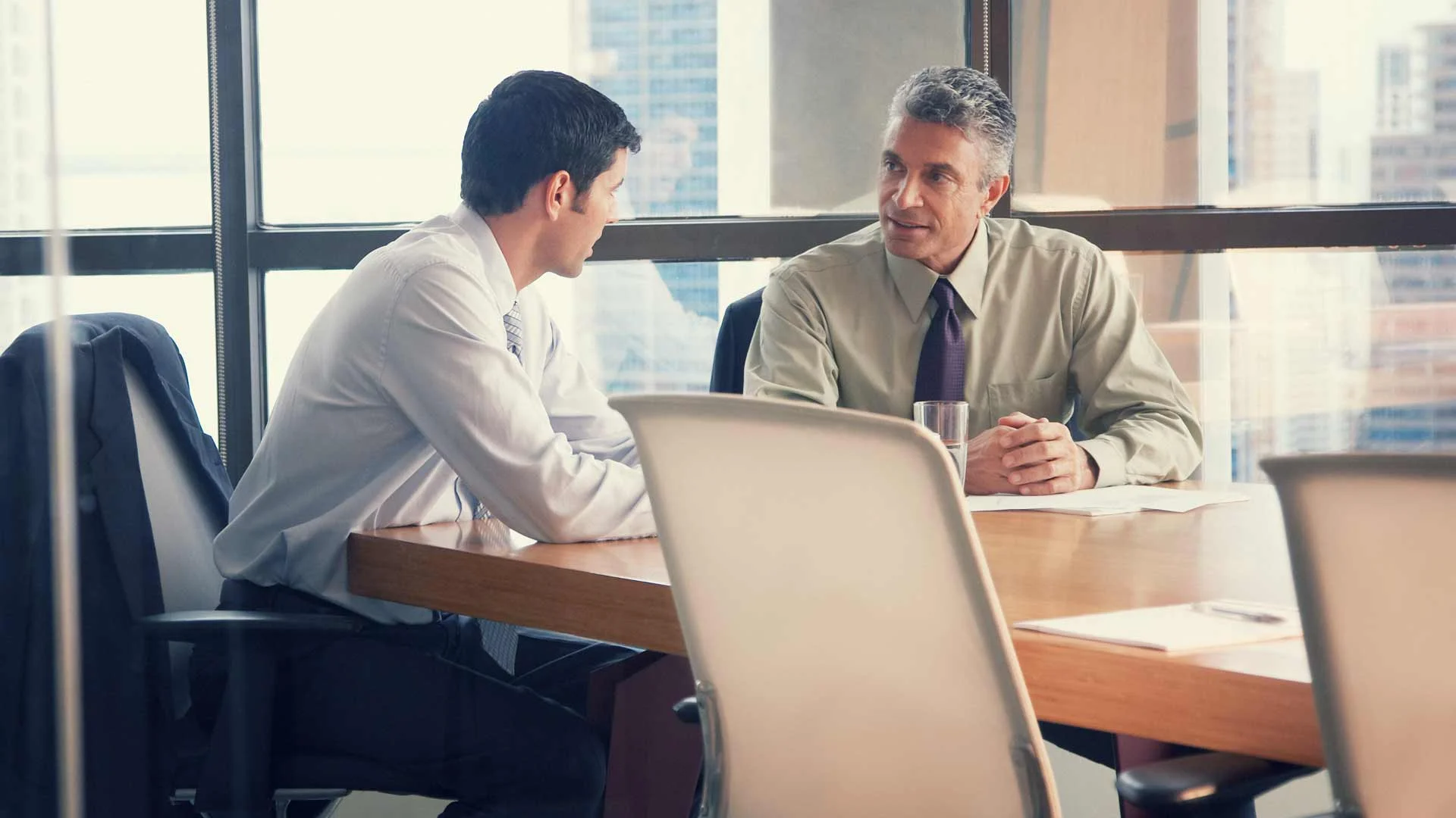 Young man in a job interview in an office.