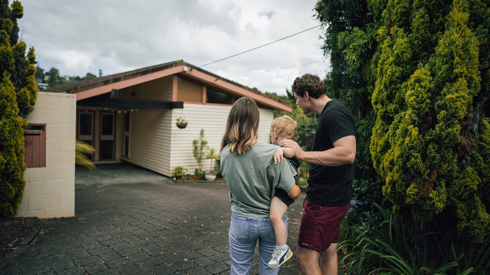 House with illustration of someone searching for a new property