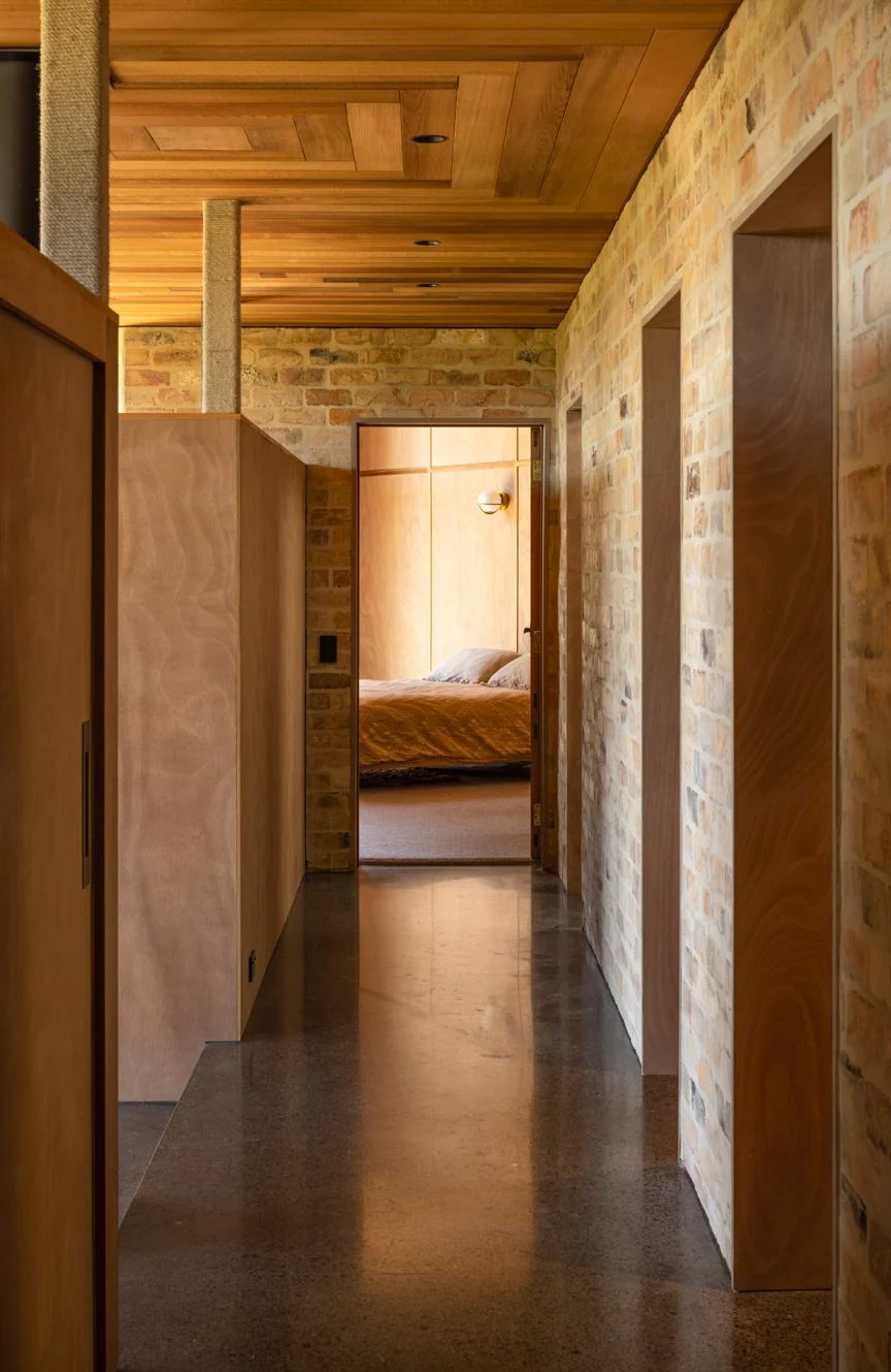 Reclaimed brick runs throughout the house.