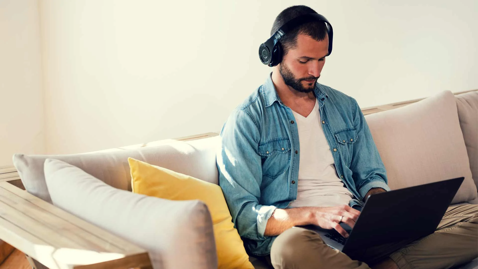Man creating a Trade Me Jobs profile on his laptop.
