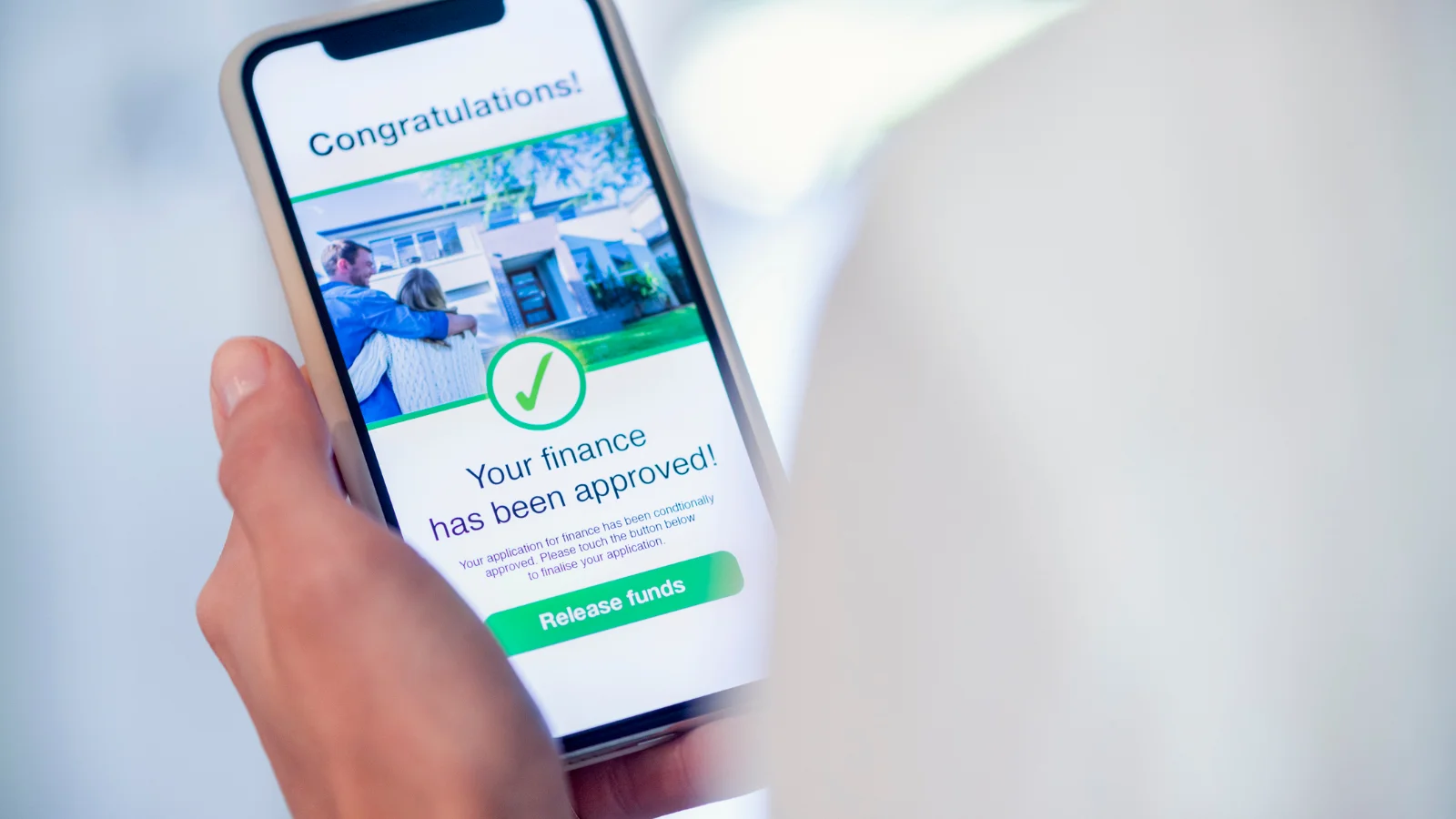 Home loan approval on mobile phone. 