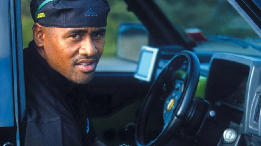 Jonah Lomu sitting in a car