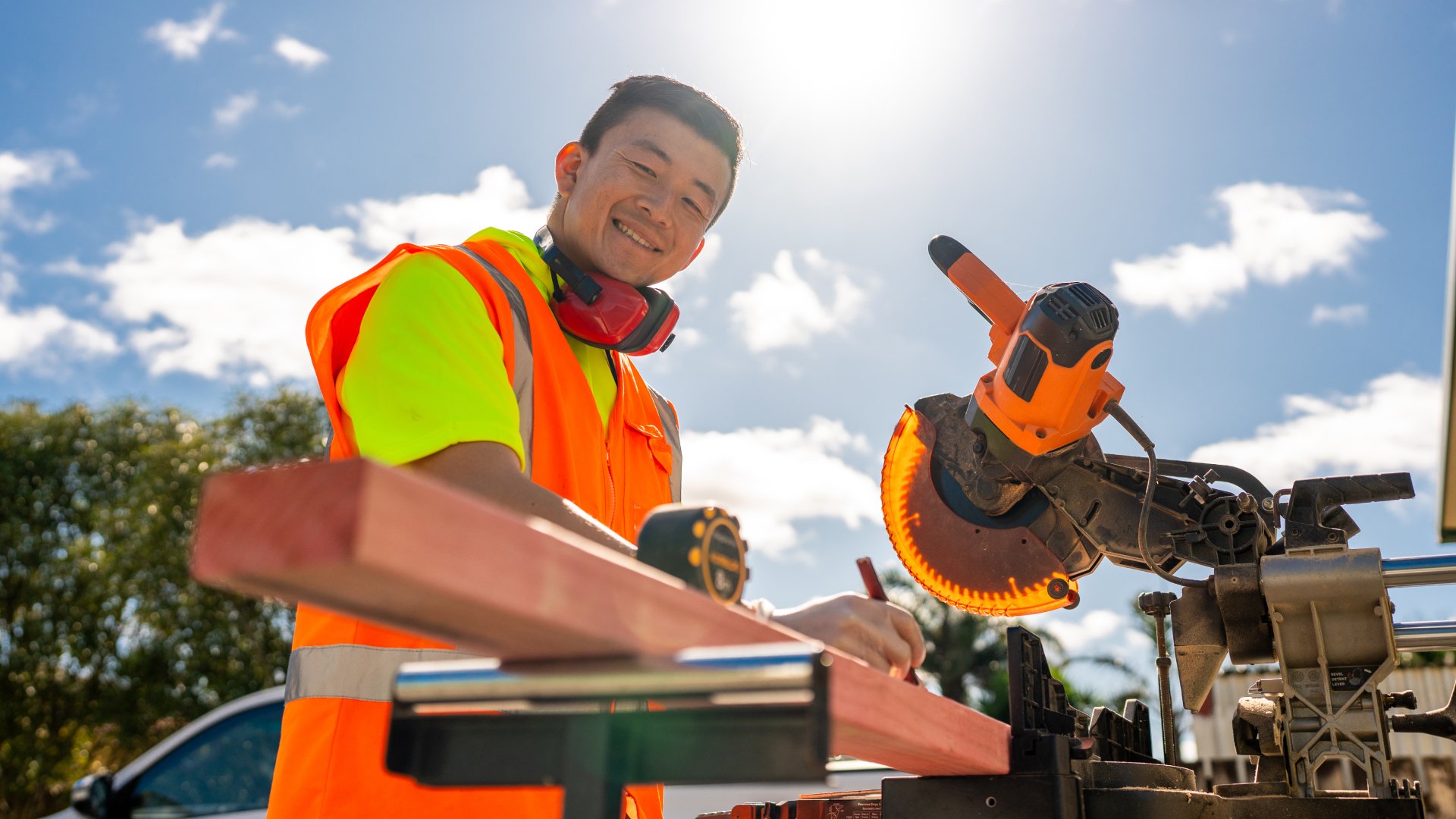 Male tradie working outdoors.