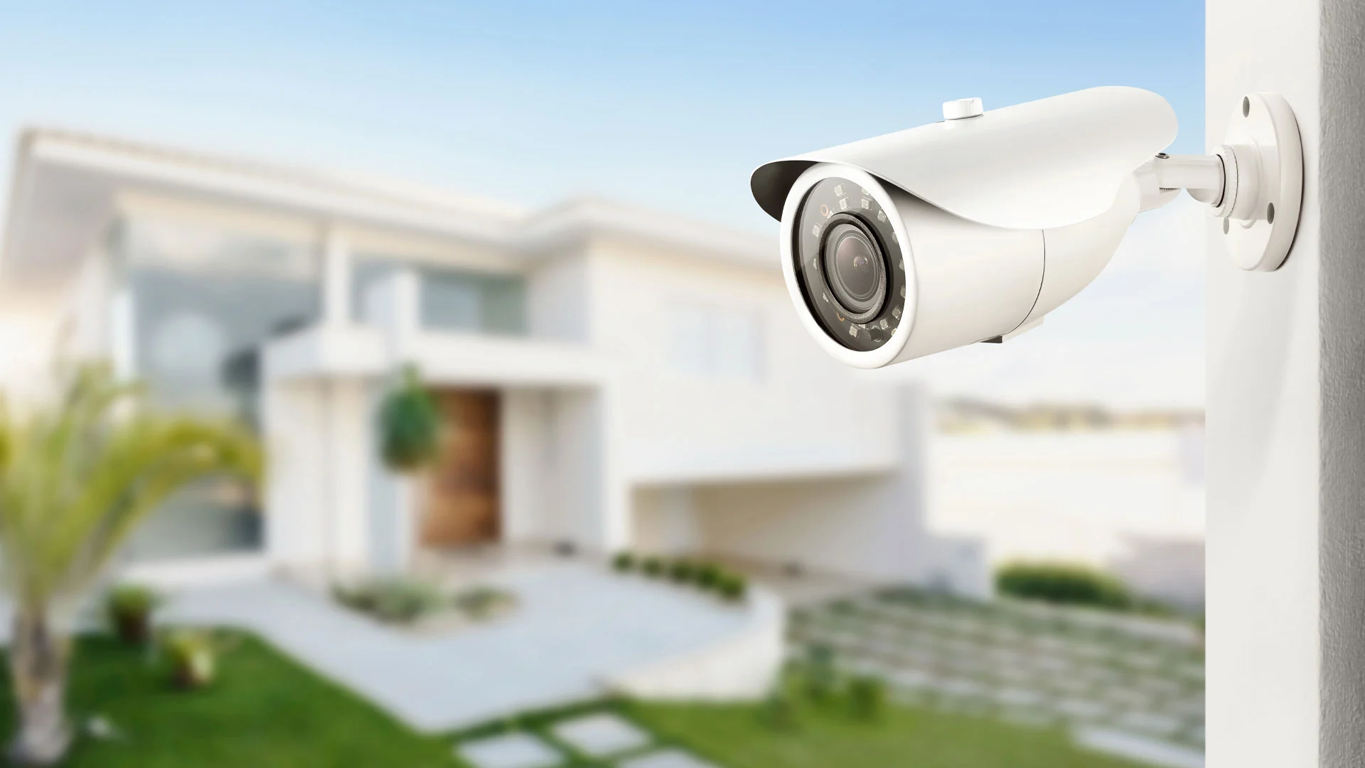 Image of a home in New Zealand with a security camera overlooking the garden.