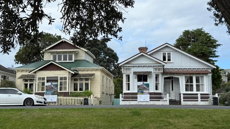 Two Devonport villas, one family, four generations. The properties, on a prime waterfront position on Queens Parade, have been sold to the same buyer for $4.5 million each. Photo: HARCOURTS