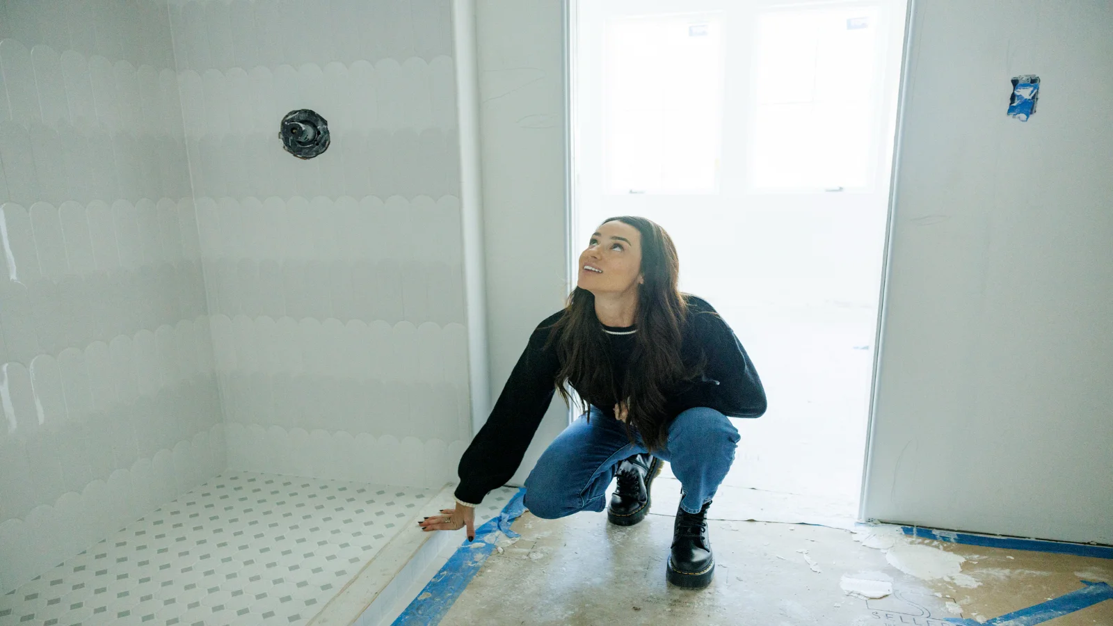 Lady doing DIY bathroom reno