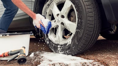 cleaning car wheel