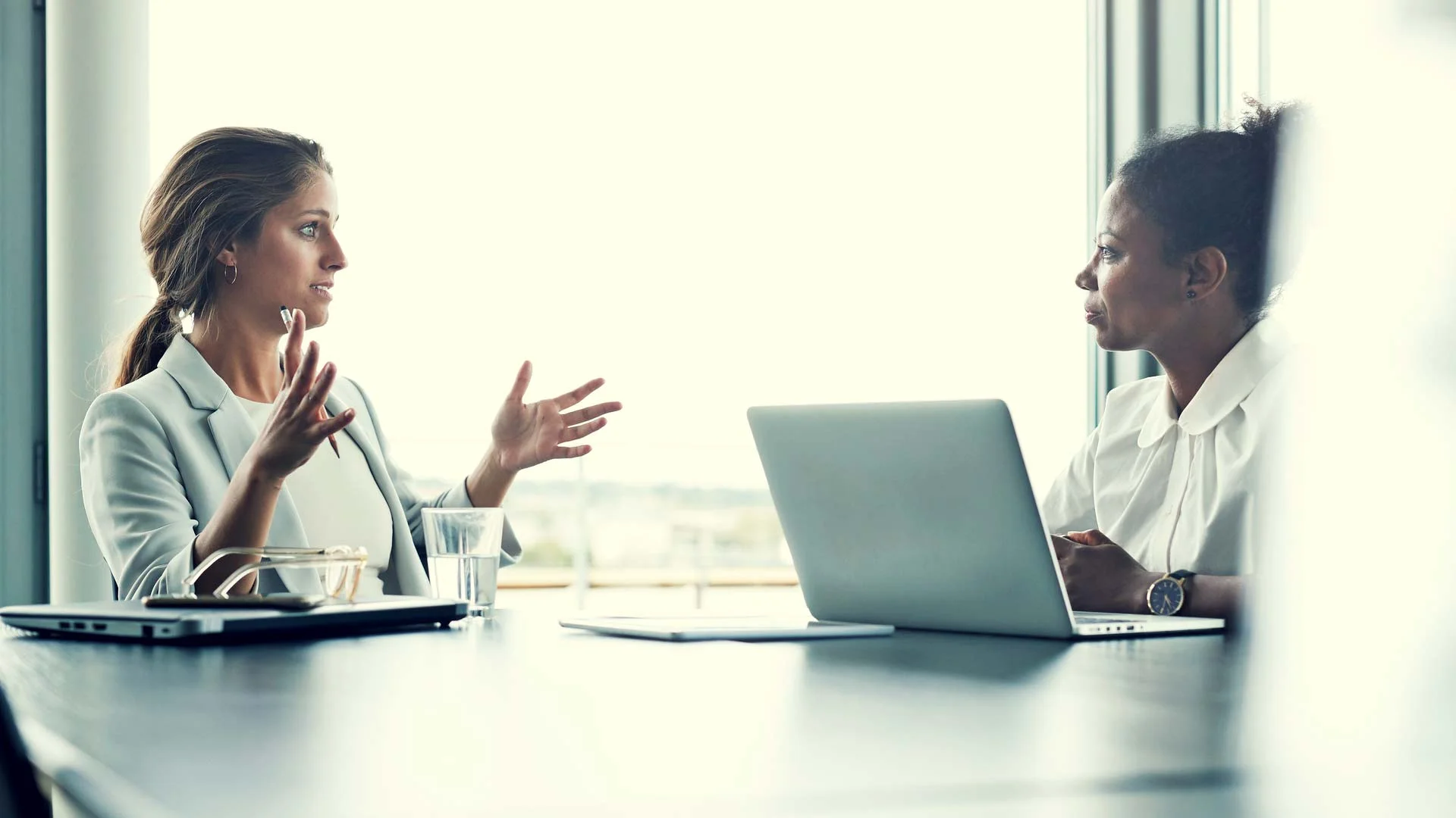 Women negotiating in a boardroom