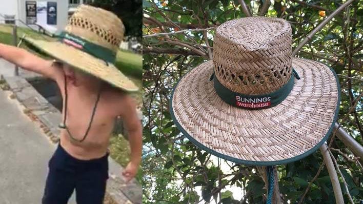 One of the unruly tourists wearing their Bunnings Warehouse hat.