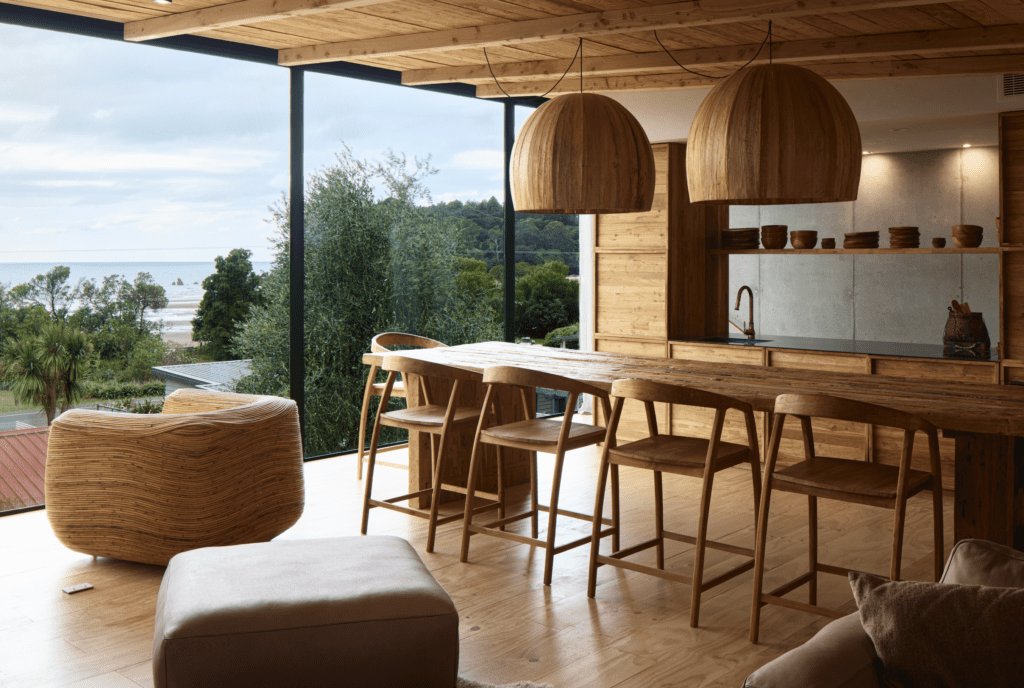 With the ever-changing seascape for inspiration, natural materials are woven into the interior of this Golden Bay home. Photo: HOME Magazine