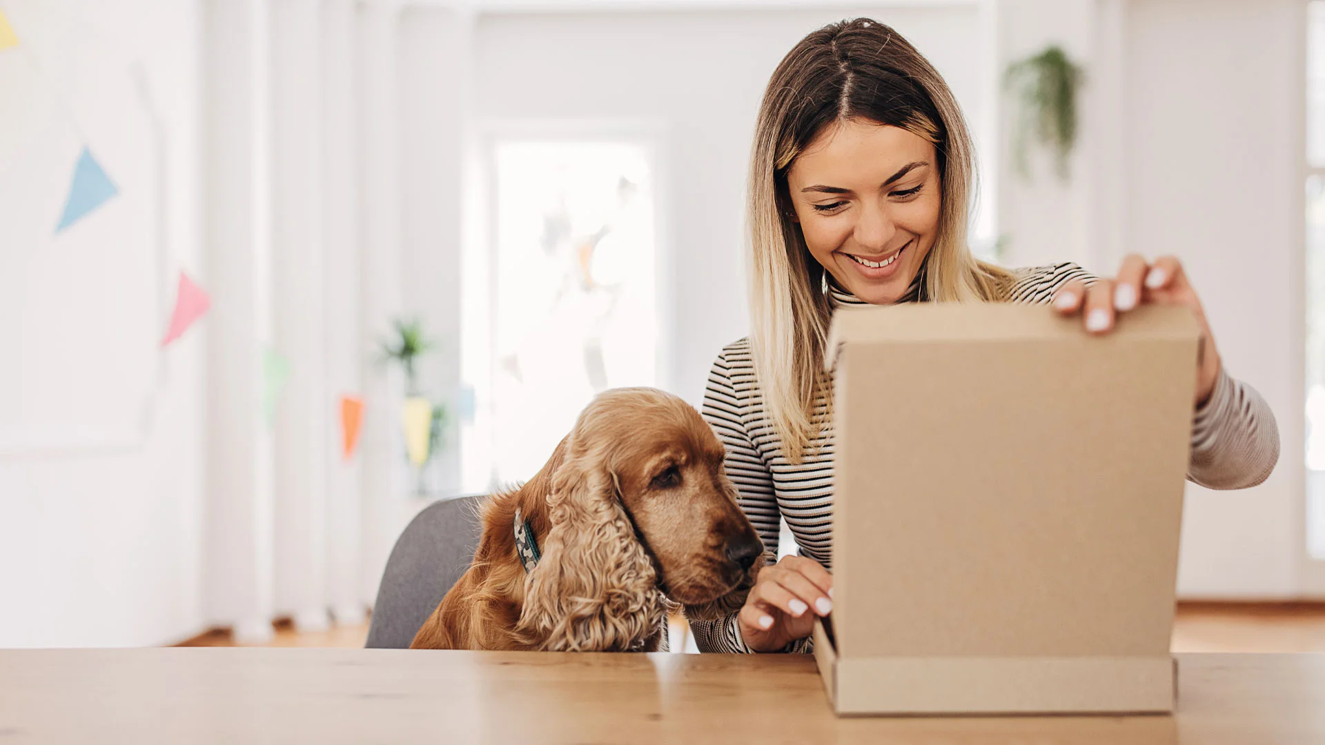 New employee receiving a welcome pack in the post from their new employer.