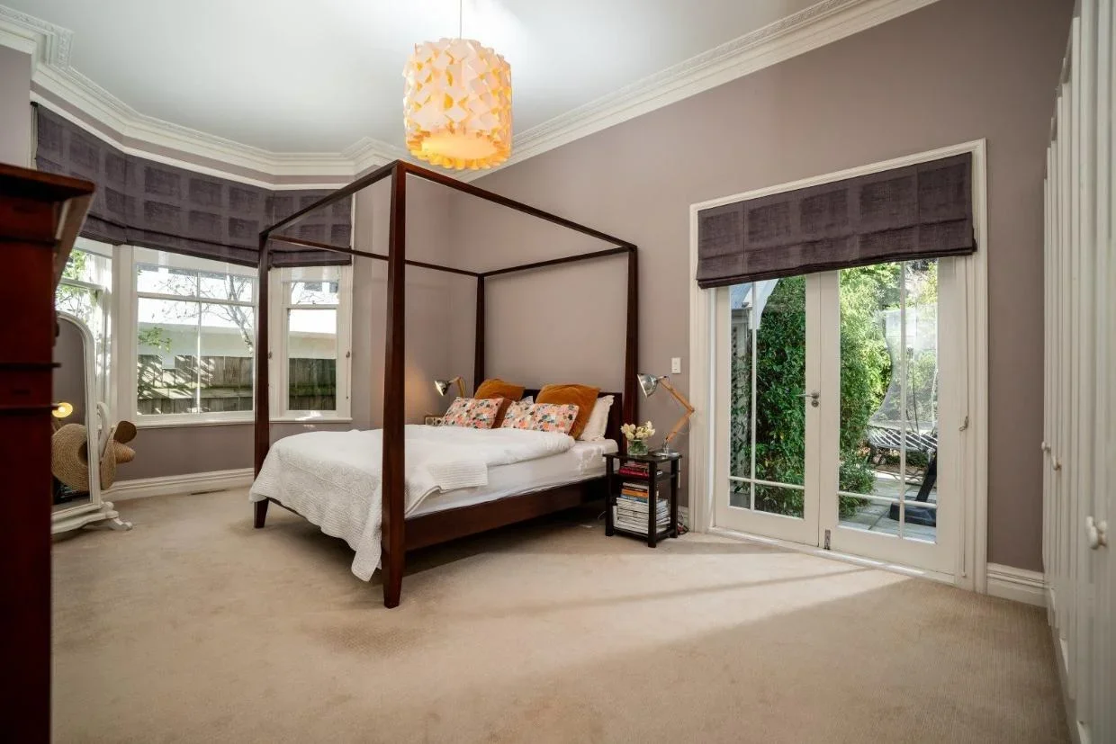 The master suite also opens onto the garden. There are four bedrooms in the home.