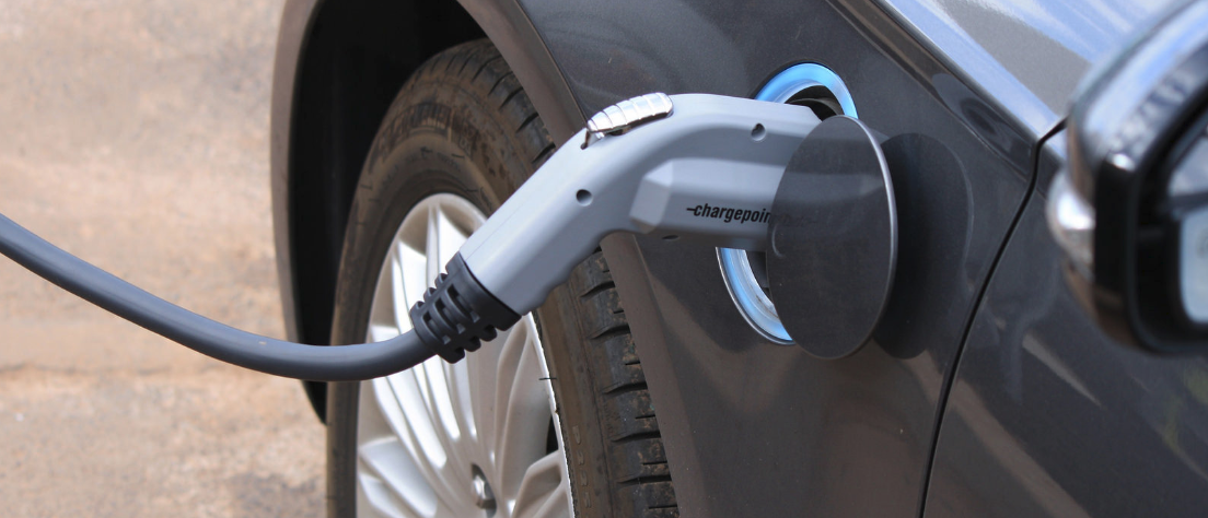 An electric vehicle charging its battery