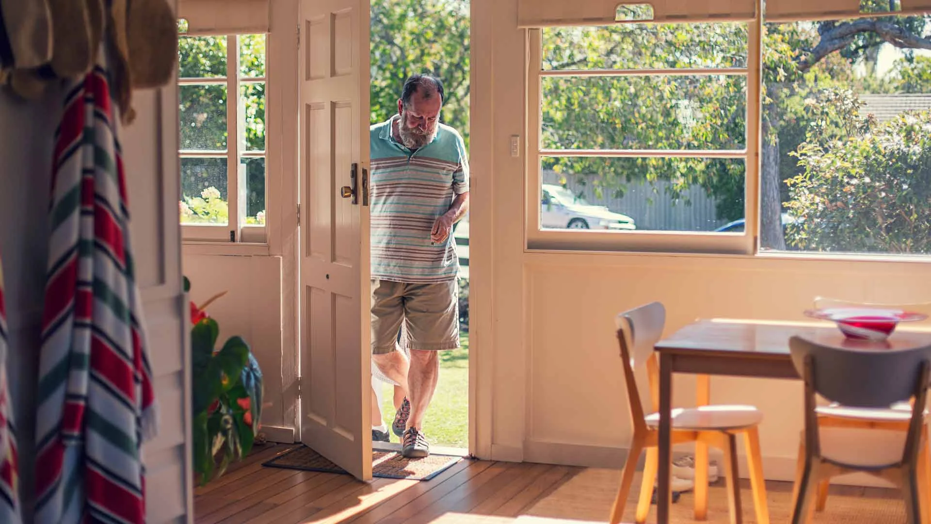 Landlord entering his rental property to do an inspection.