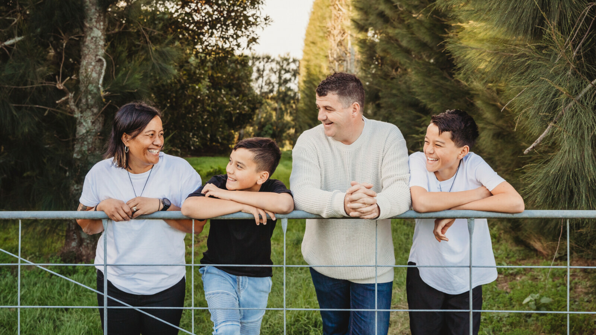 Mother sitting on deck with son