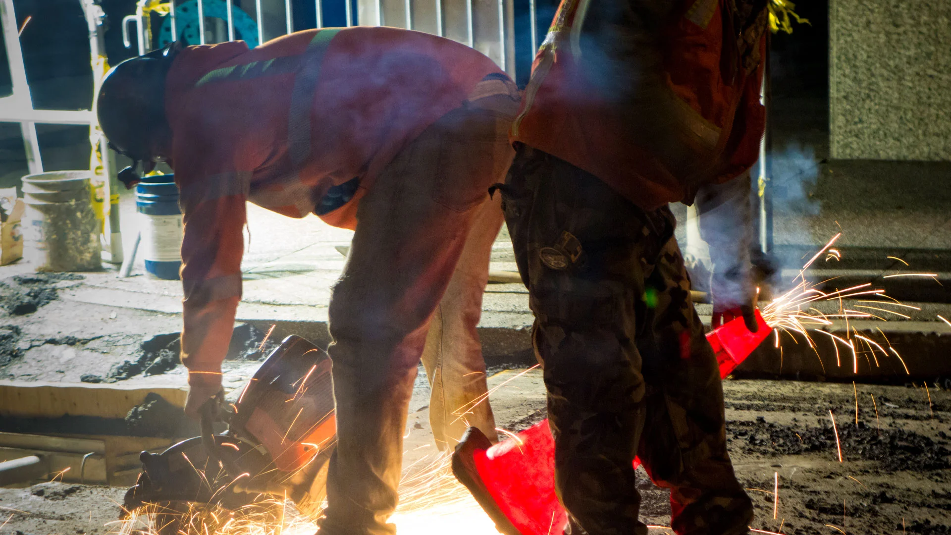 Road construction crew working through the night repairing a road in New Zealand.