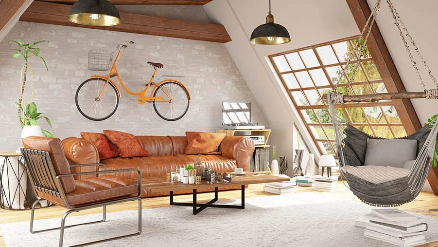 Contemporary attic living room with large window, hanging chair and a bike mounted on the wall.