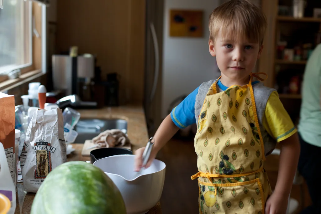 A child cooking in the kitchen