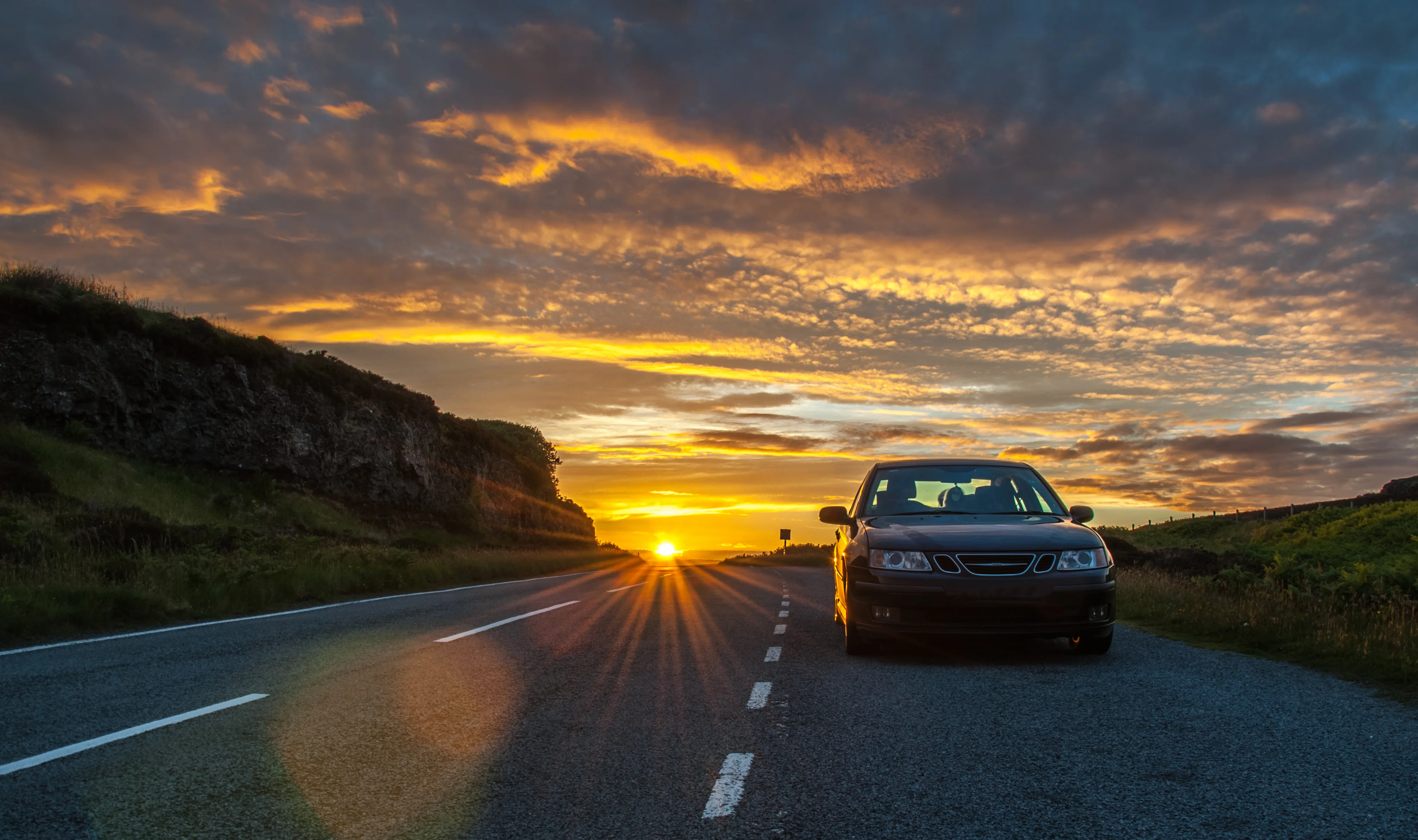 car at sunset