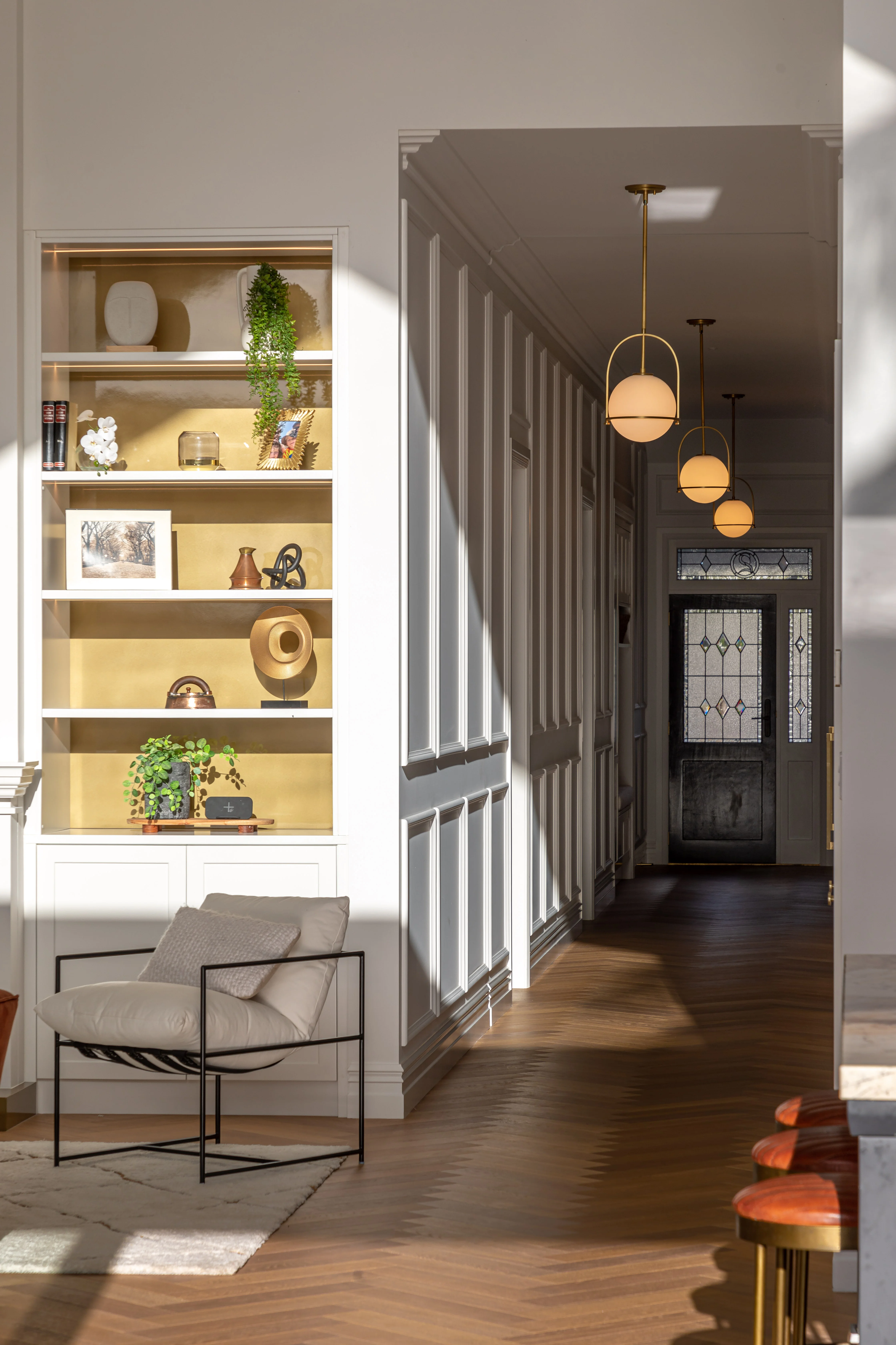 In this renovated home with interiors by Sticks + Stones Design, wood panels add to the heritage character. Image: John Williams