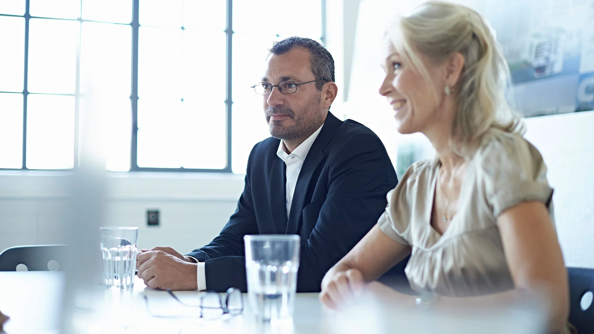 Job interview panel listening to a candidate answering questions.