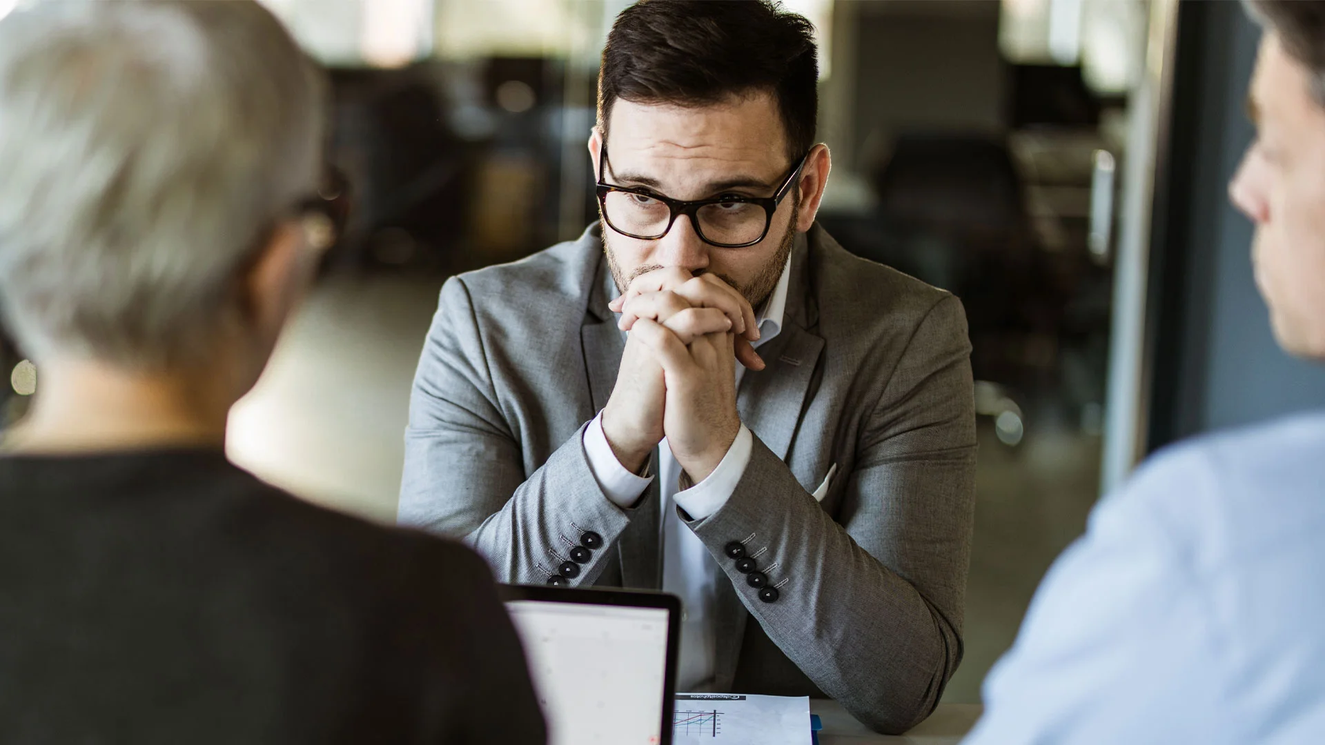 Worried man in a job interview.