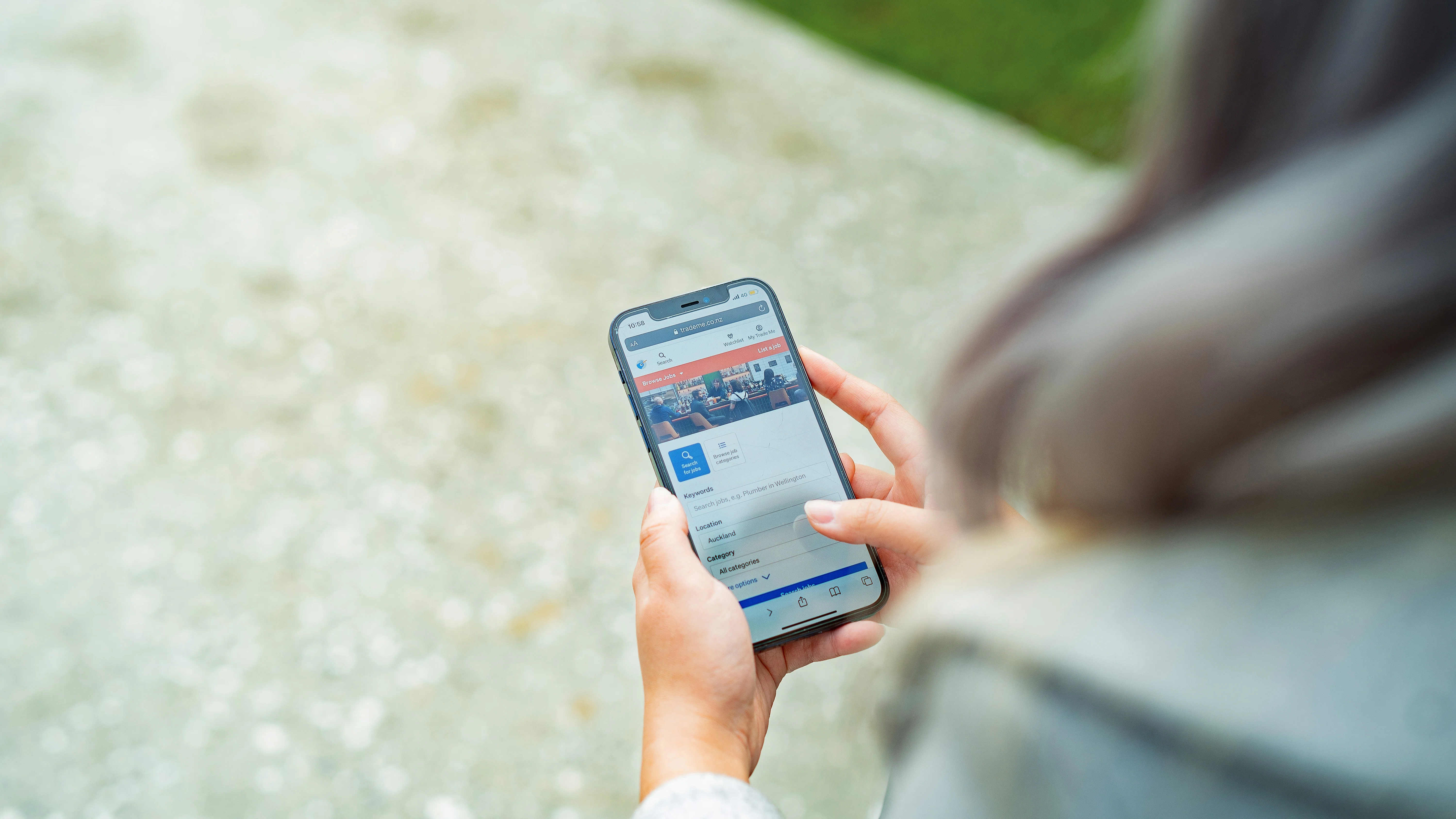 Girl searches on Trade Me Jobs to see what opportunities are out there.